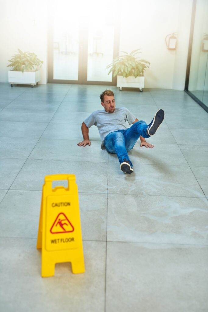 worker falling on slippery floor