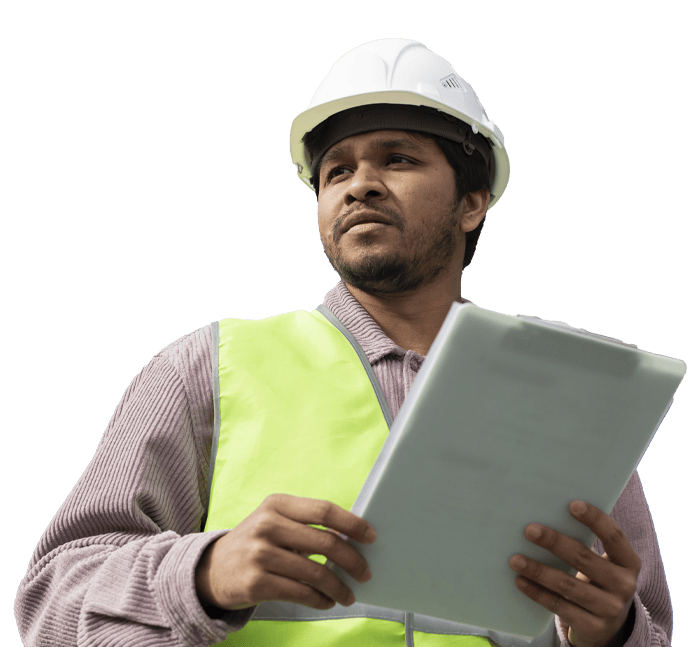 A person wearing a white hard hat and a bright yellow safety vest holds a clipboard. The individual looks to the side with a focused expression, appearing to be at an outdoor work site, much like those you might spot featured on a website's homepage slider.